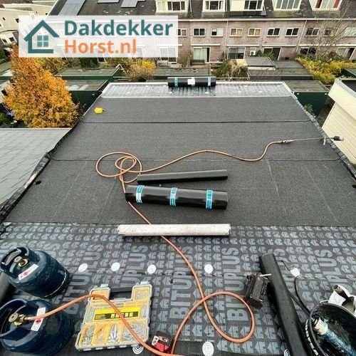 Plat dak opnieuw leggen Plat dak Horst opnieuw leggen